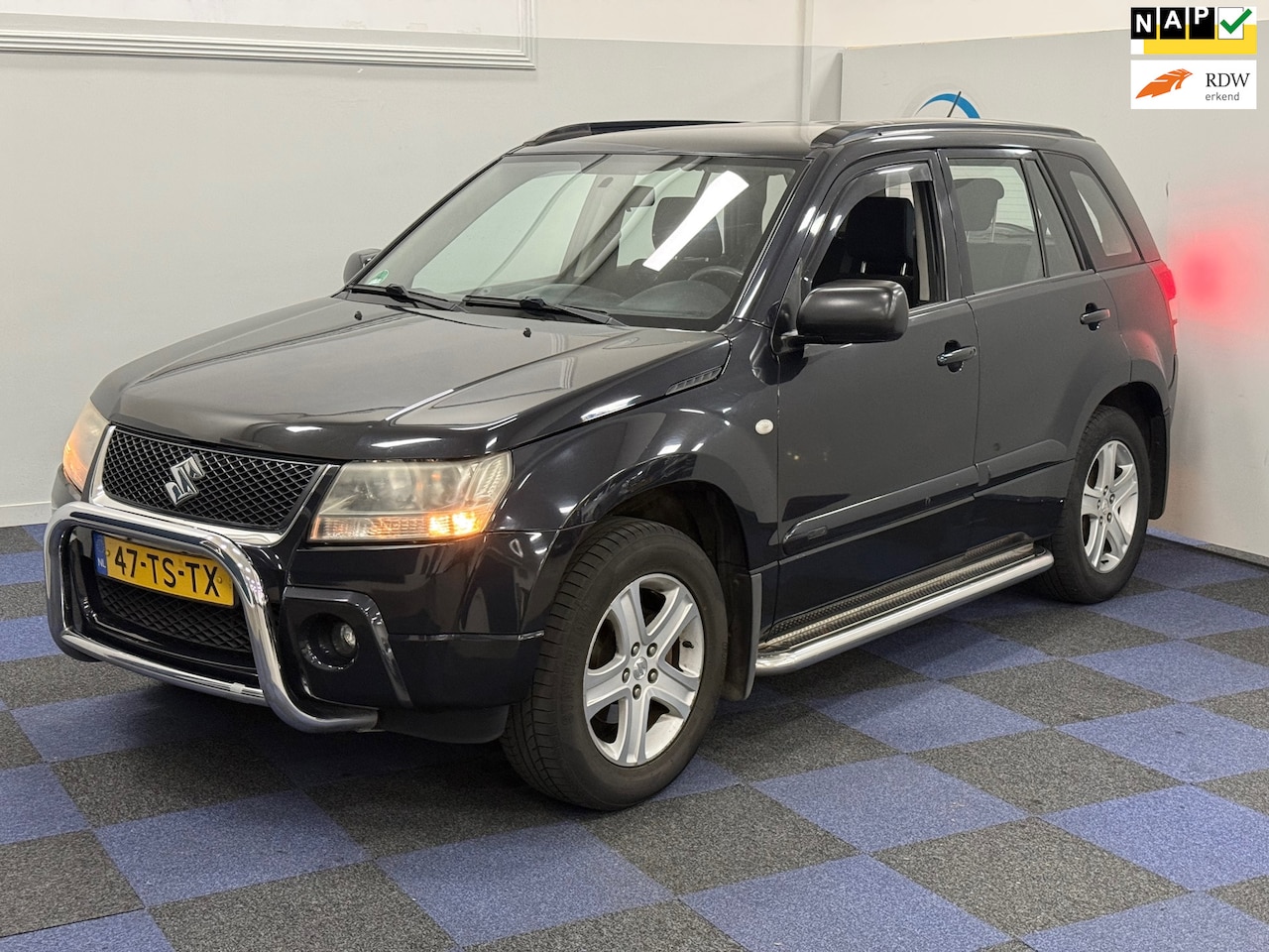 Suzuki Grand Vitara - 2.0-16V Exclusive / IJSKOUDE AIRCO / DEALER ONDERHOUDEN / RIJDT SCHAKELT GOED - AutoWereld.nl