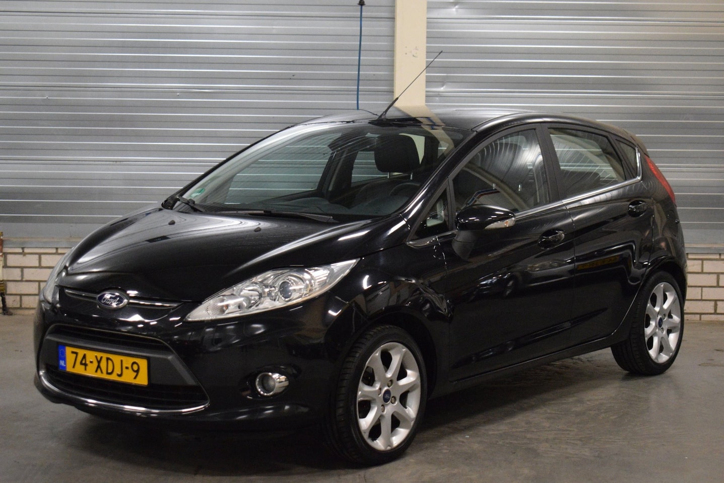 Ford Fiesta - 1.25 Titanium X-Pack + Lederen Bekleding|Stoelverwarming|Bluetooth|Climate Control|Cruise - AutoWereld.nl