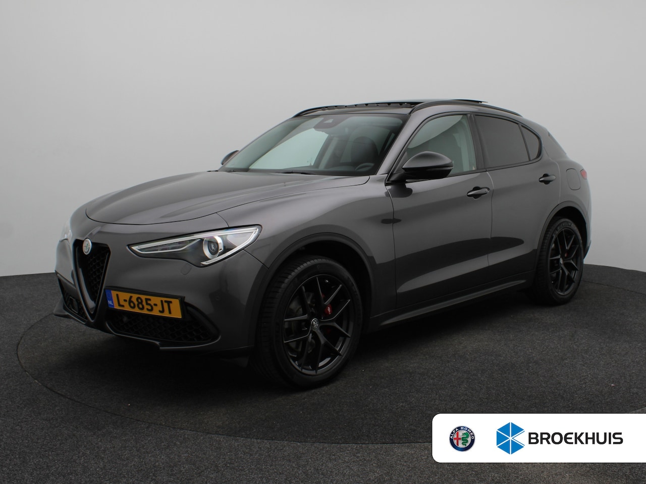 Alfa Romeo Stelvio - 2.0 T AWD B-Tech 280 Pk | Panoramisch schuifdak | Elek. stoelen | Stoel en stuurverwarming - AutoWereld.nl