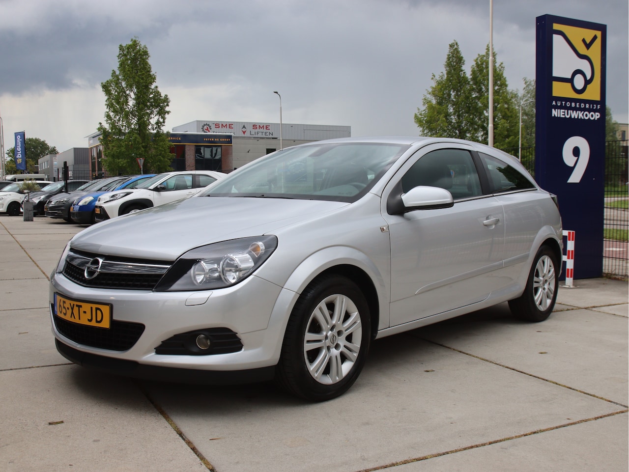 Opel Astra GTC - 1.6 Cosmo NL-Auto, Climate, Cruise, NAP Lente actie! - AutoWereld.nl