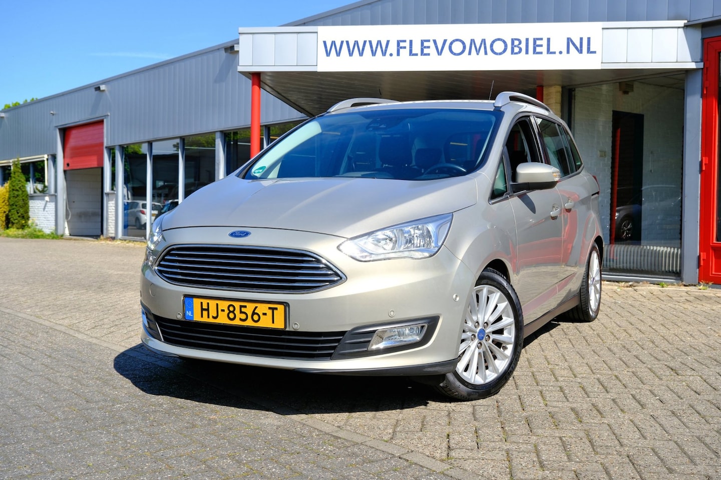 Ford Grand C-Max - 1.5 Titanium Aut. Leder|Navi|Clima|LMV|Cruise|Trekhaak - AutoWereld.nl