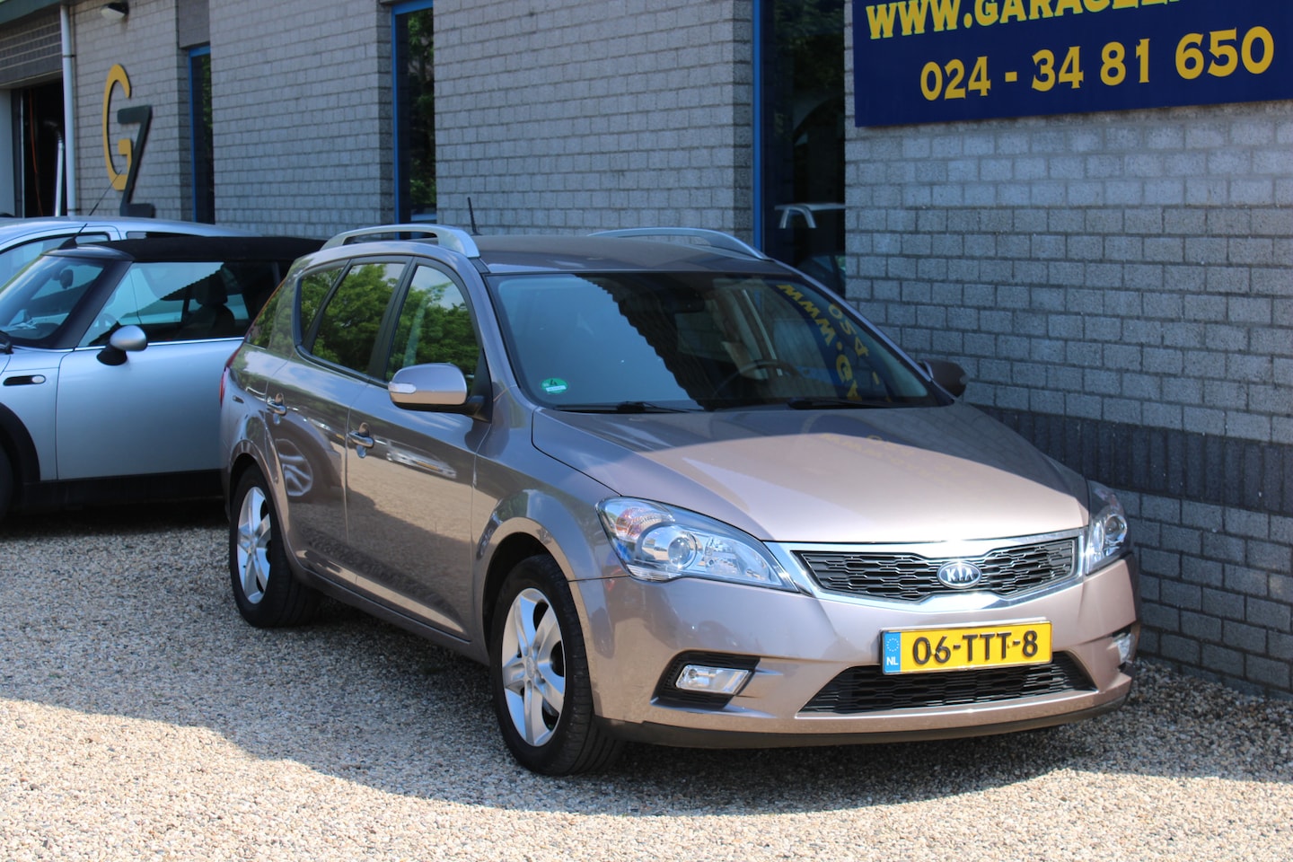 Kia Cee'd Sporty Wagon - 1.6 CRDi Super Pack Clima trekhaak Navi - AutoWereld.nl