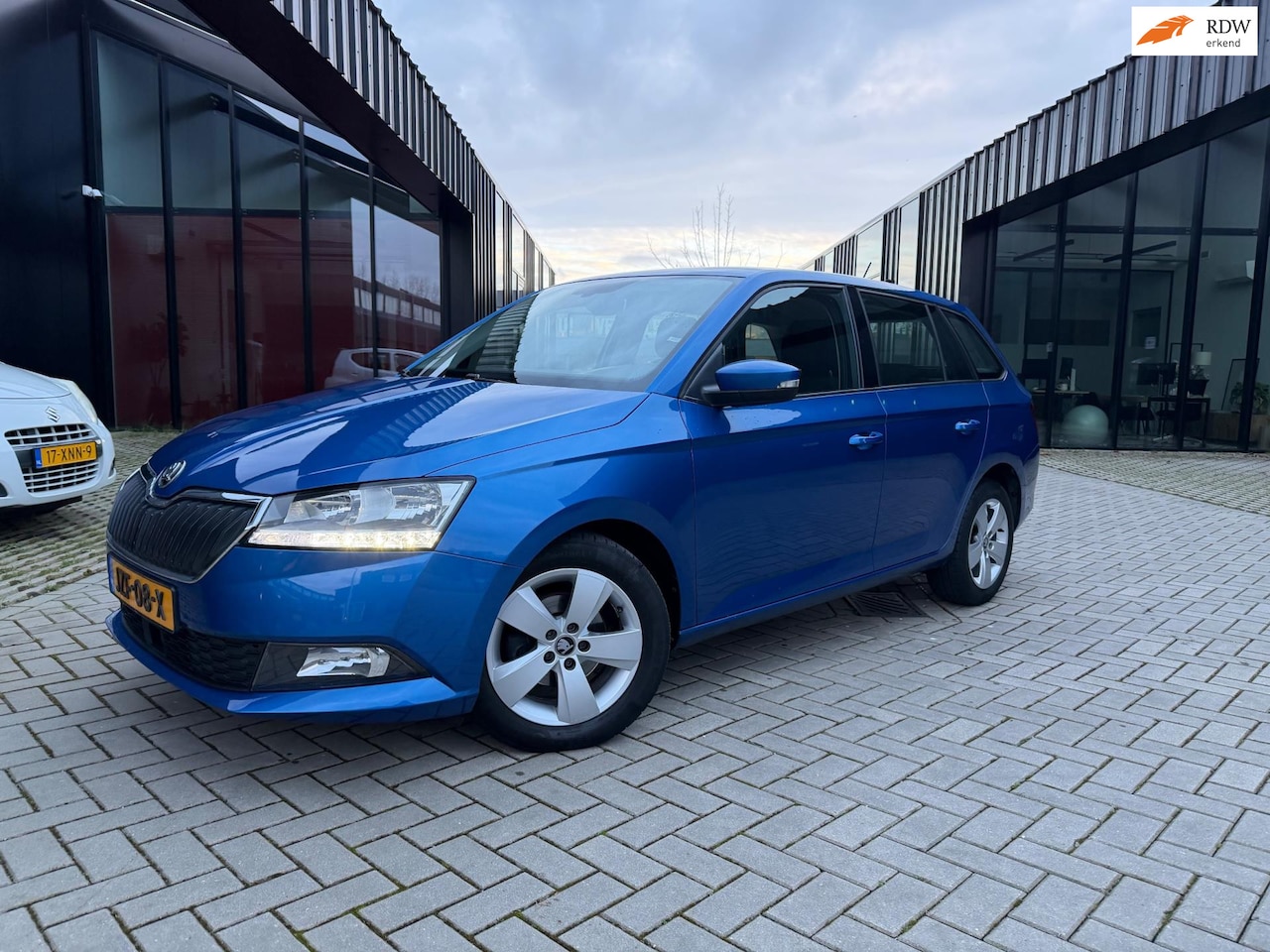 Skoda Fabia Combi - 1.0 TSI Active Clima Cruise Navi PDC - AutoWereld.nl