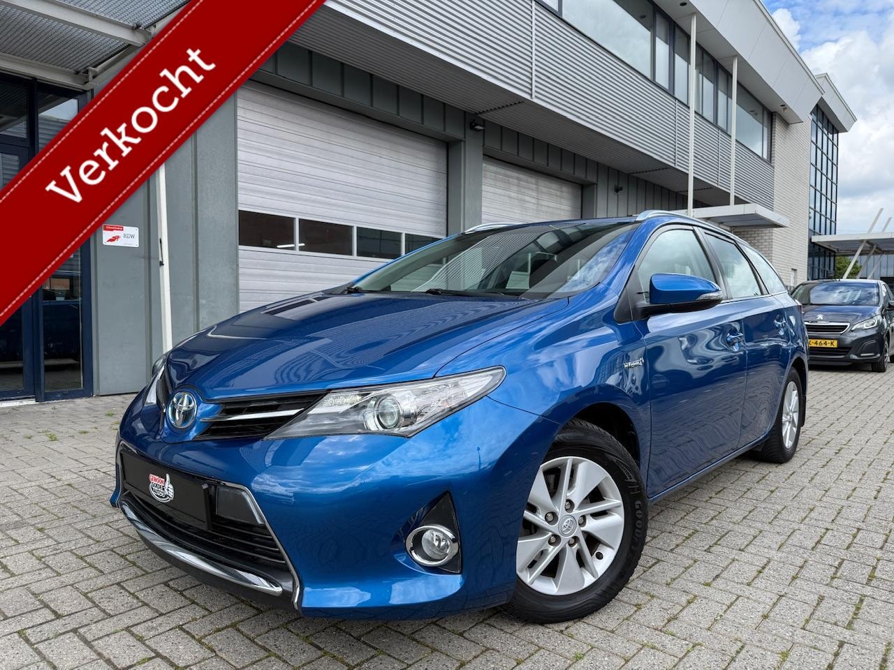 Toyota Auris Touring Sports - 1.8 Hybrid Toyota Historiek - AutoWereld.nl