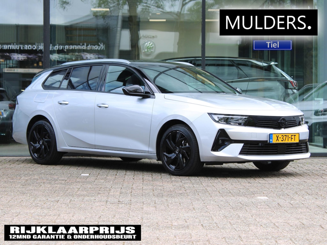 Opel Astra Sports Tourer - 1.2 Turbo GS Automaat | Navi / Camera / Winter pakket - AutoWereld.nl