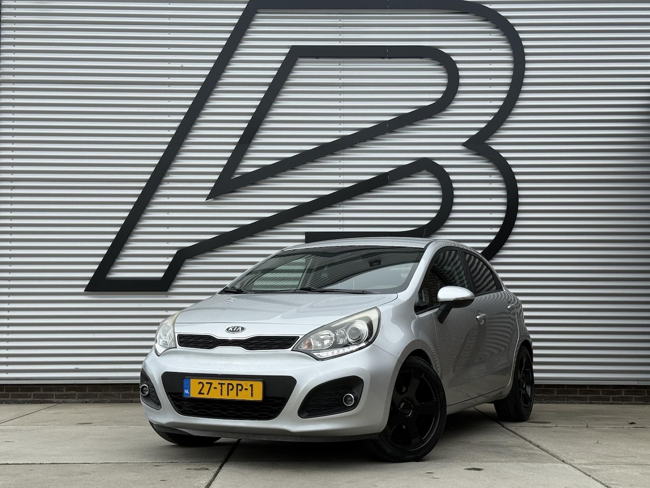 Kia Rio - 1.2 CVVT Super Pack 1e Eigenaar|Navi|Clima|Cruise|PDC|Lm velgen|N.A.P|Nieuwe APK bij aflev - AutoWereld.nl