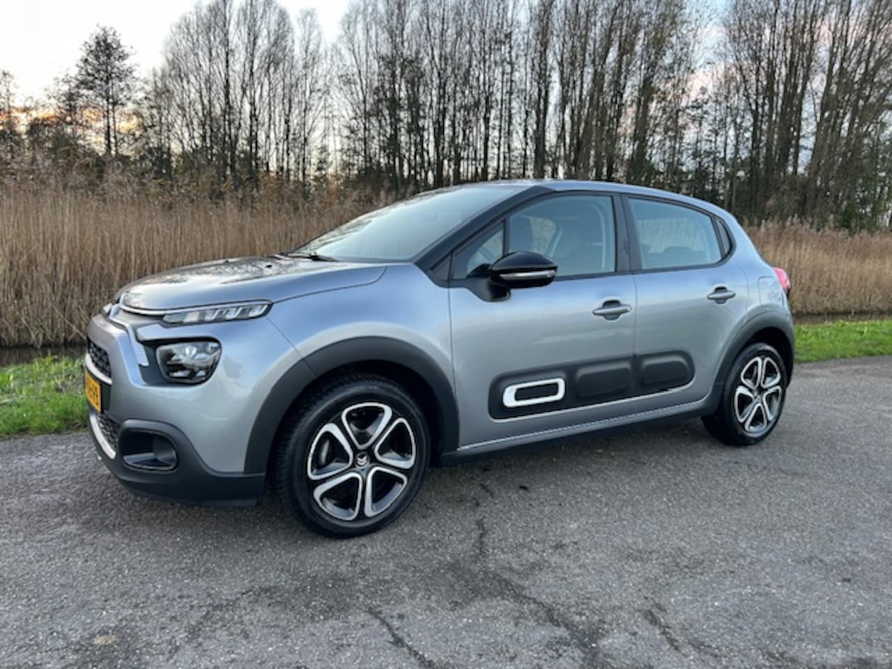 Citroën C3 - 1.2 PureTech 83pk Feel | Navigatie | Climate control | Pdc | Cruise control | Apple carpla - AutoWereld.nl