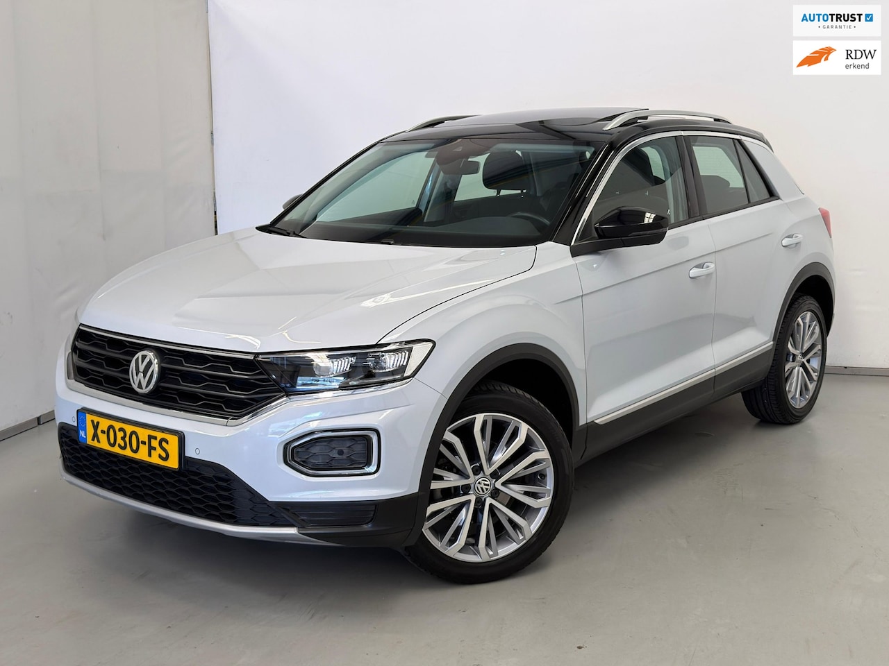 Volkswagen T-Roc - 1.5 TSI Sport / Automaat / Stoelverwarming / Clima - AutoWereld.nl