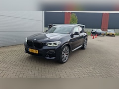 BMW X4 - M40i M-sport | panoramadak | head-up display | 360 camera | elektrische trekhaak | keyless