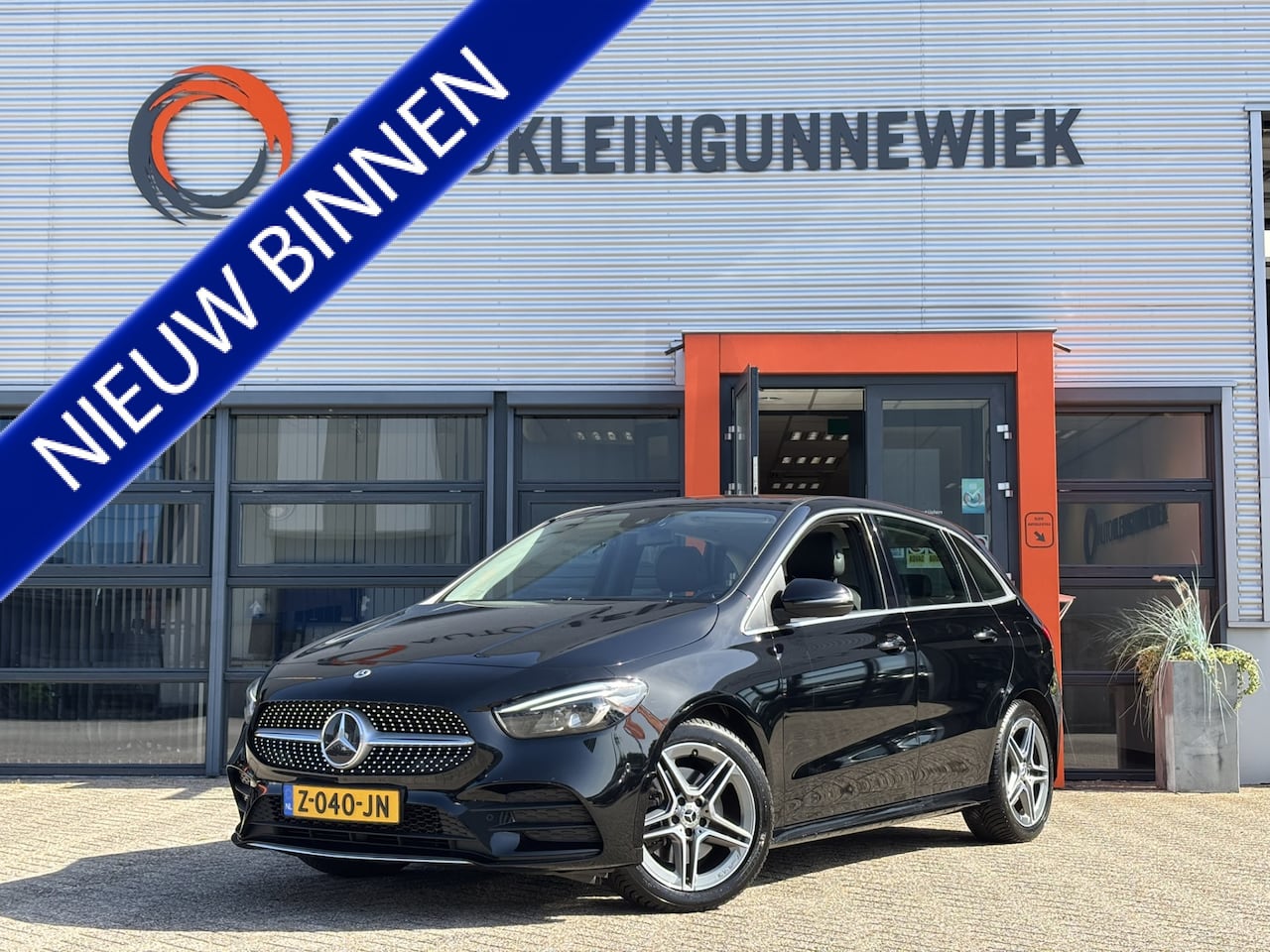 Mercedes-Benz B-klasse - 250 e AMG Line PHEV / Afneembare Trekhaak / Allseason Banden / Stoelverwarming / Applecarp - AutoWereld.nl
