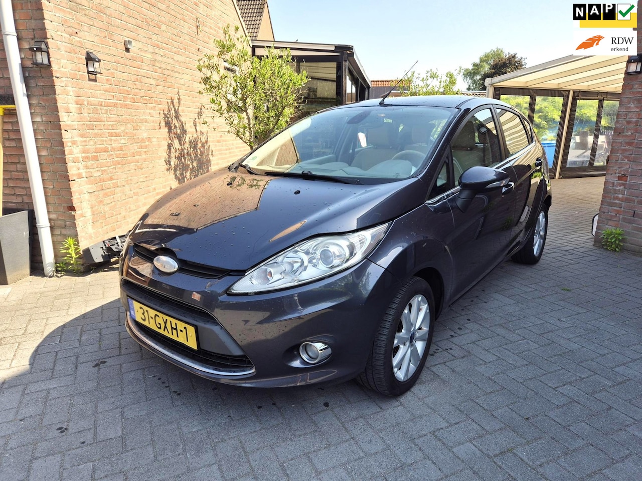 Ford Fiesta - 1.25 Ghia 5 Drs Met Clima - AutoWereld.nl