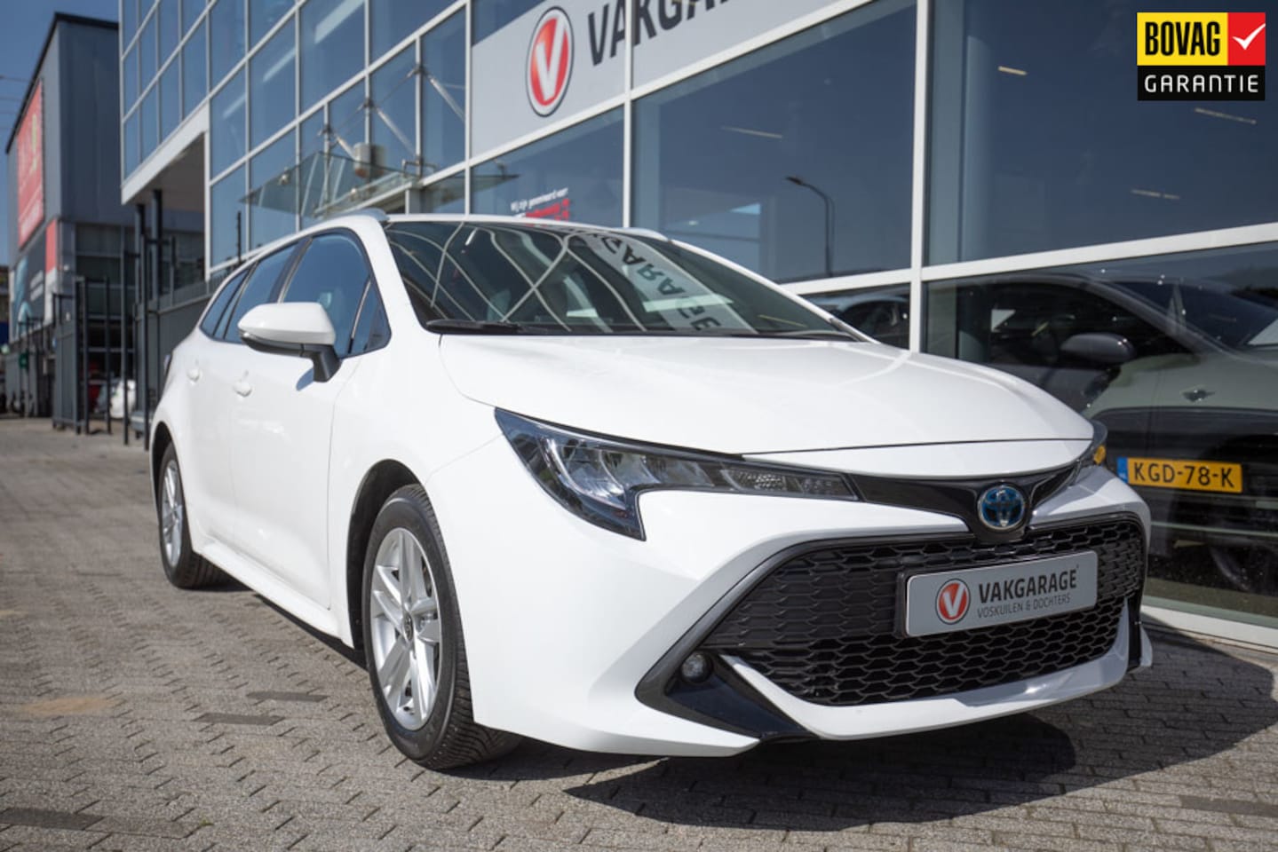 Toyota Corolla Touring Sports - 1.8 Hybrid Business | Stoelverwarming - AutoWereld.nl