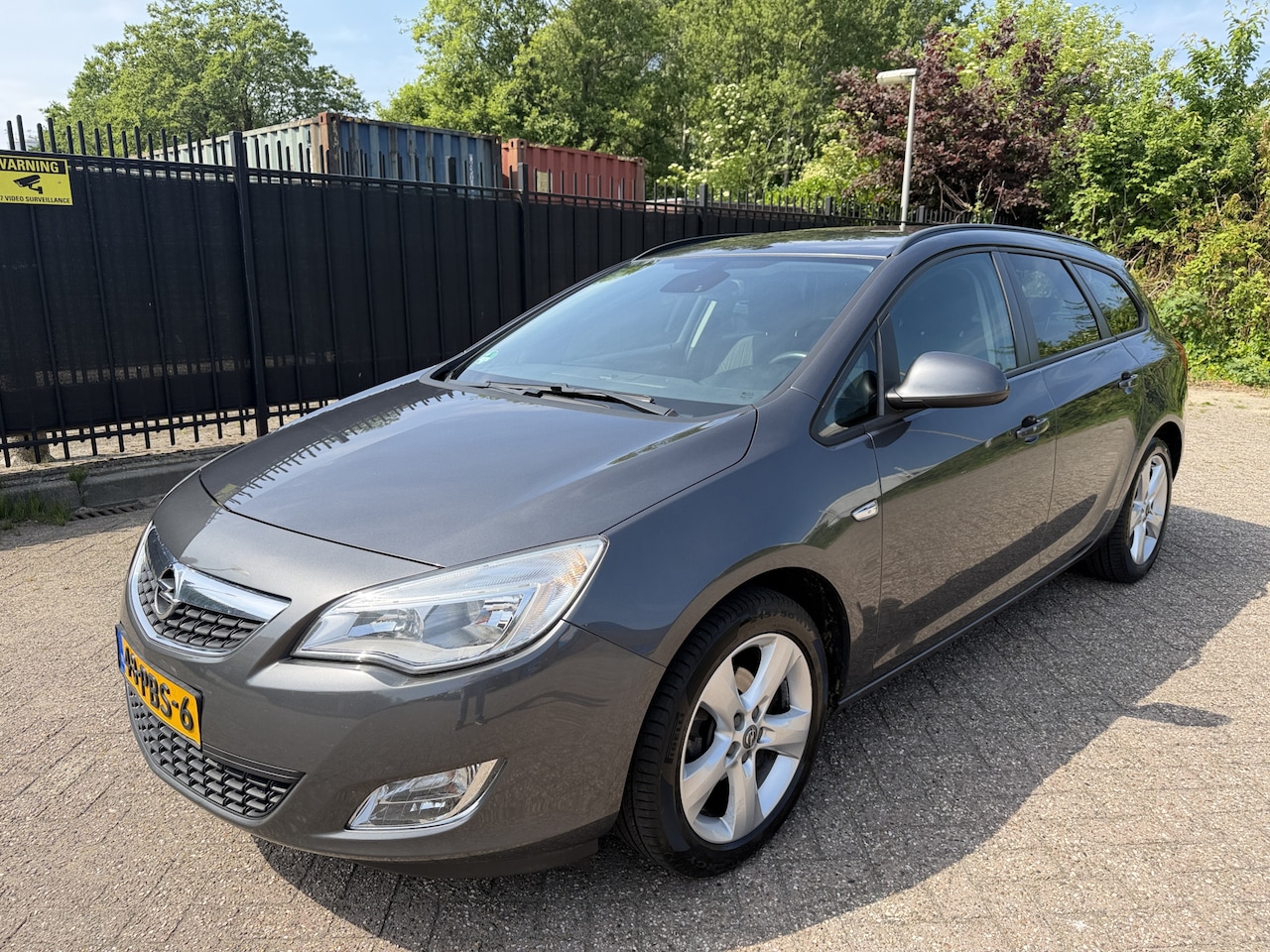Opel Astra Sports Tourer - 1.4 Turbo Edition Airco/Cruise/Trekhaak - AutoWereld.nl