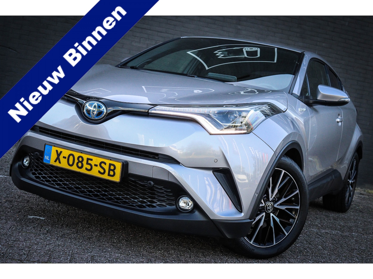 Toyota C-HR - 1.8 Hybrid Executive Net binnen - Nu al te bezichtigen - AutoWereld.nl