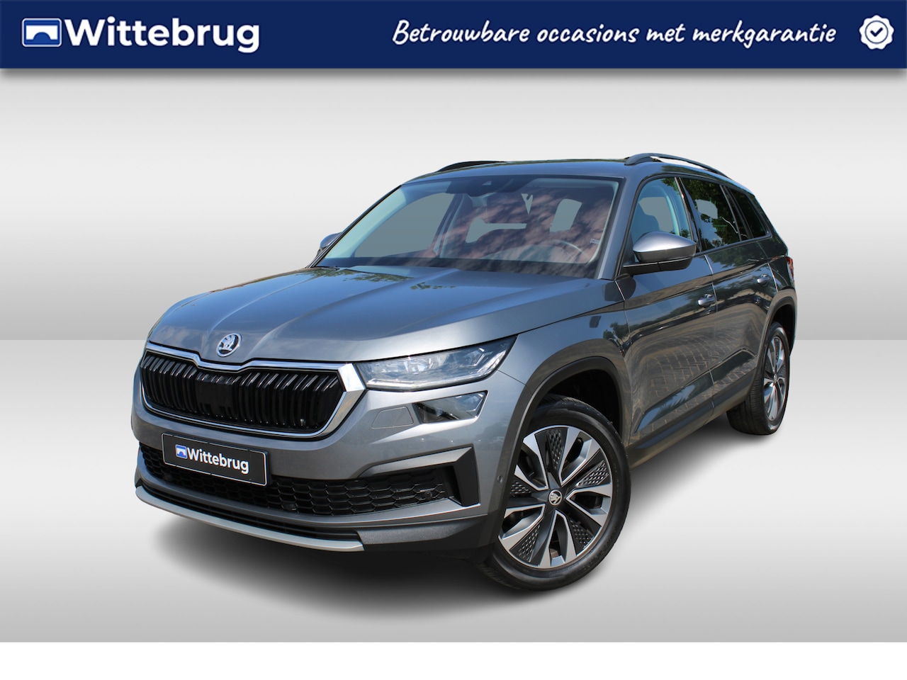 Skoda Kodiaq - 1.5 TSI 150pk Ambition Tour DSG Automaat / Navigatie / LM 19 inch / LED Matrix / Camera / - AutoWereld.nl