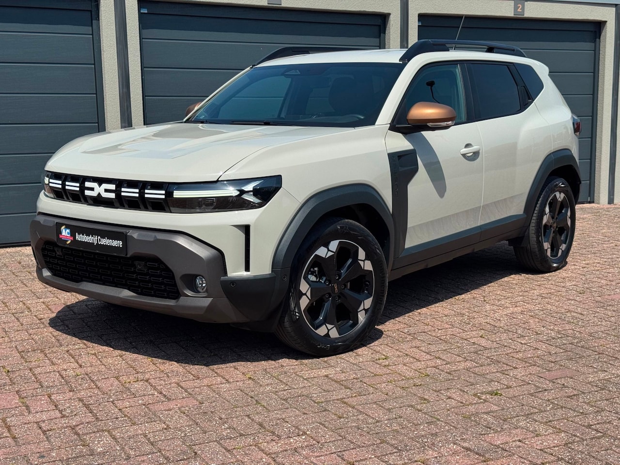 Dacia Duster - 1.6 Hybrid 140 Extreme CarPlay / Clima / P-sensoren / Camera - AutoWereld.nl