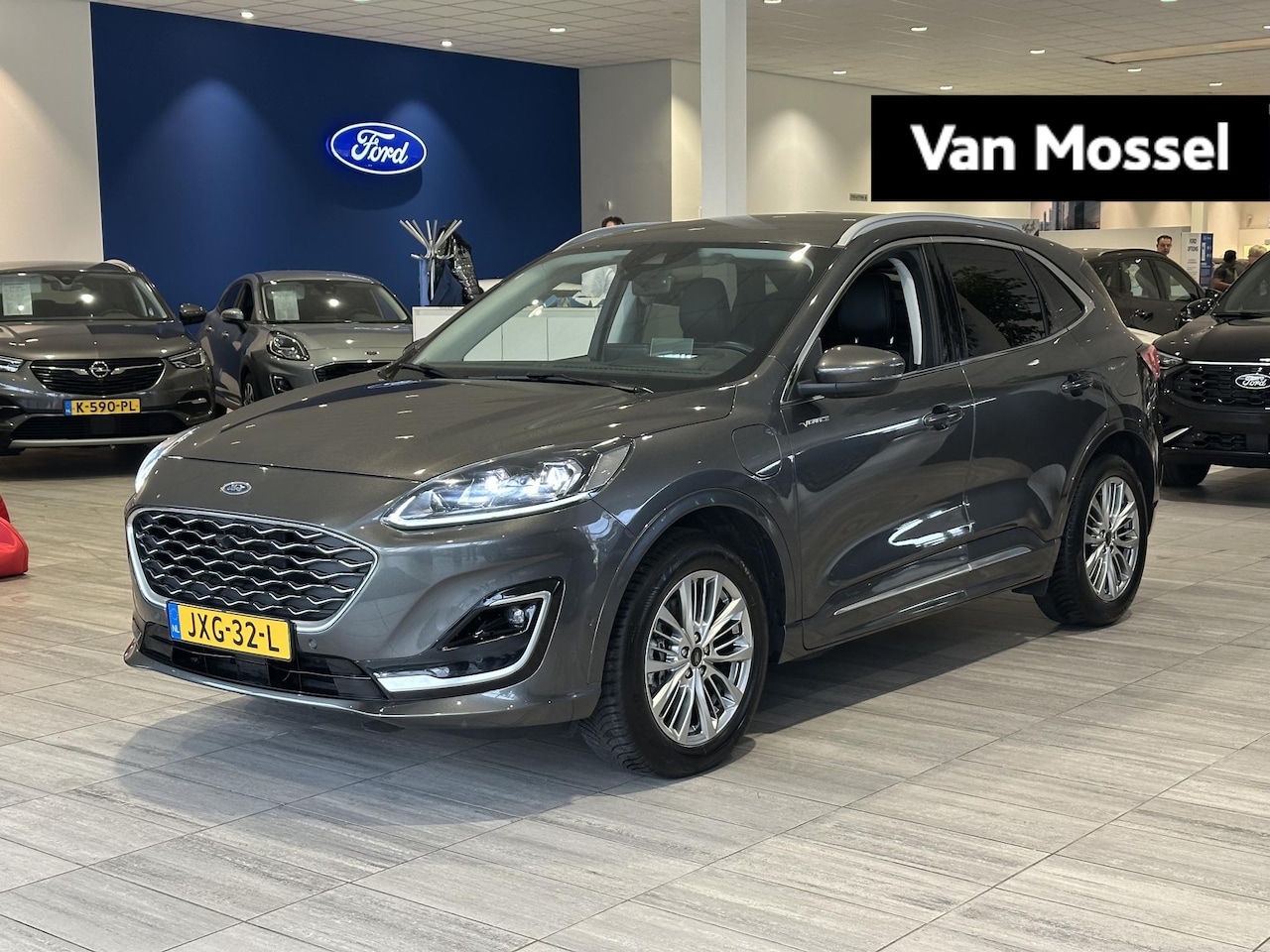 Ford Kuga - 2.5 PHEV Vignale | Memory seat | Elektrische achterklep | B&O | Winter pack | - AutoWereld.nl