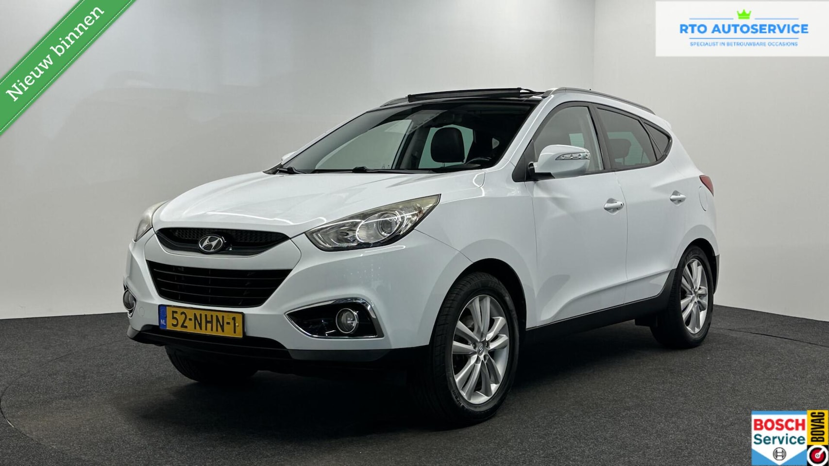 Hyundai ix35 - 2.0i i-Catcher TREKHAAK LEER PANO NAVI CRUISE ECC. - AutoWereld.nl