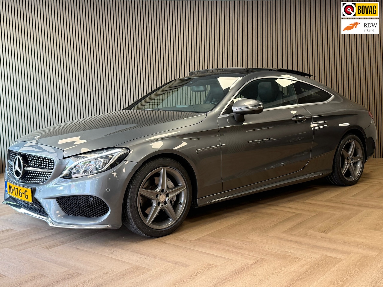 Mercedes-Benz C-klasse Coupé - C180 Ambition AUT AMG PANORAMADAK NAVI CAMERA PDC - AutoWereld.nl