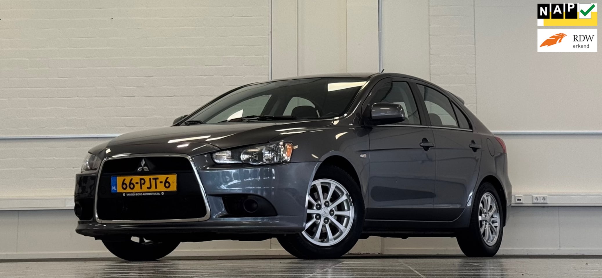 Mitsubishi Lancer Sportback - 1.6i 16V Edition One 1e Eigenaar - AutoWereld.nl