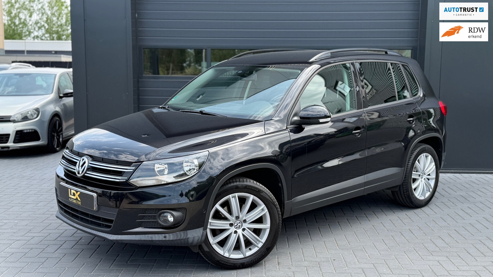 Volkswagen Tiguan - 1.4 TSI Sport&Style Airco|PDC|Trekhaak|Cruise - AutoWereld.nl