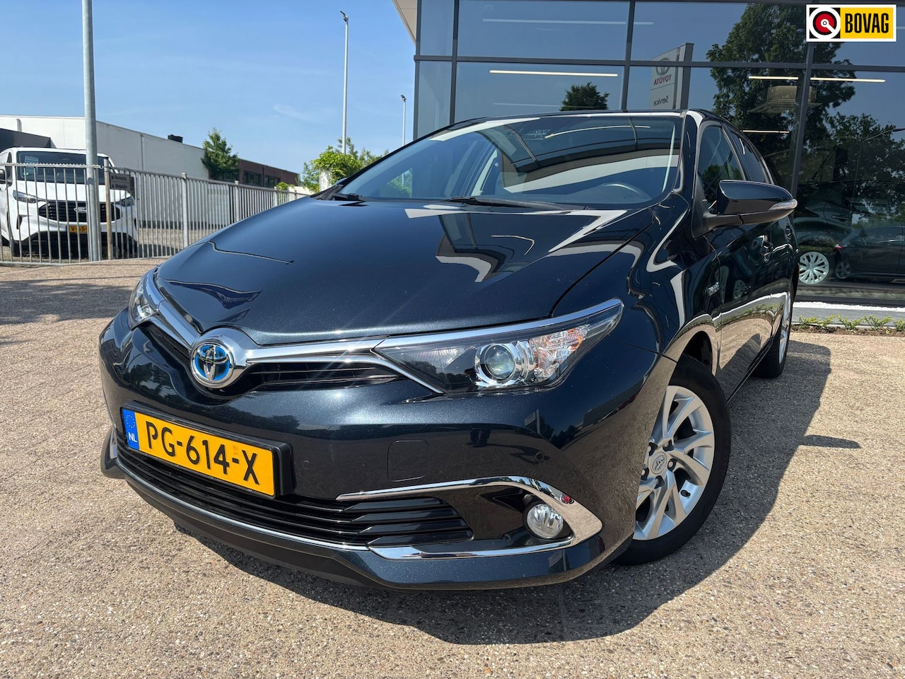 Toyota Auris - 1.8 Hybrid Executive|Trekhaak - AutoWereld.nl