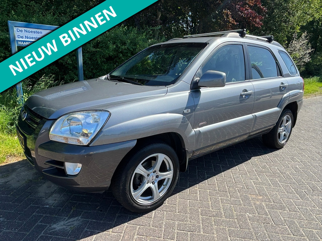 Kia Sportage - 2.0 CVVT Adventure 4WD | LPG | Distr. verv. - AutoWereld.nl
