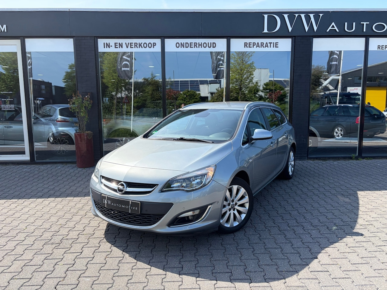 Opel Astra Sports Tourer - 1.4 Turbo Sport 1.4 Turbo Sport - AutoWereld.nl