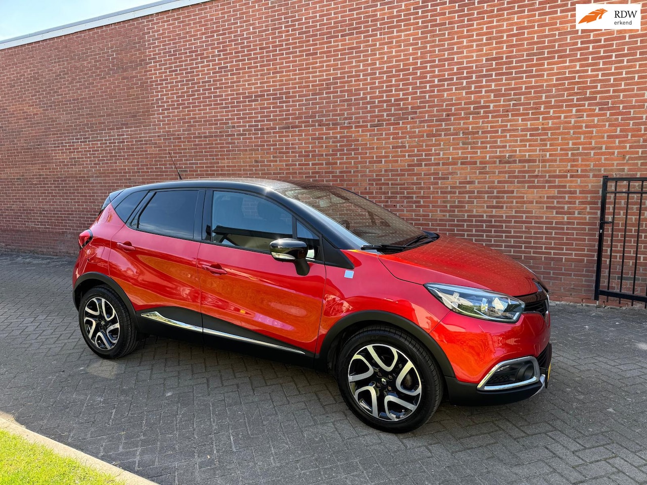 Renault Captur - 1.2 TCe Helly Hansen Navi Cruise Clima Pdc - AutoWereld.nl