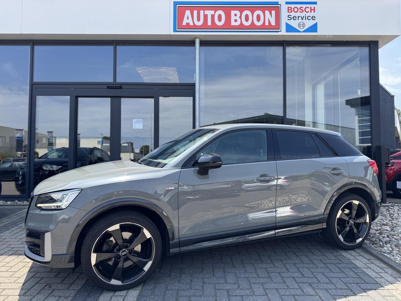 Audi Q2 - 1.4 TFSI 150PK S-TRONIC AUTOMAAT 2X S-LINE NAVI/ NANOGREY/LED/19''ROTOR/PDC/SFEER/S&S/KUIP - AutoWereld.nl