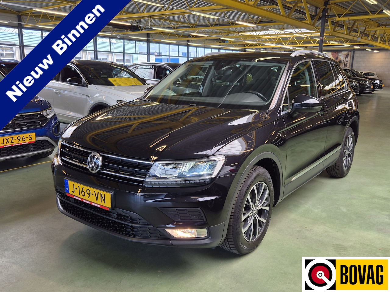 Volkswagen Tiguan - 1.4 TSI ACT Comfortline -150pk- Automaat | Navi | LED | Dodehoek sensor | ErgoActive Stoel - AutoWereld.nl