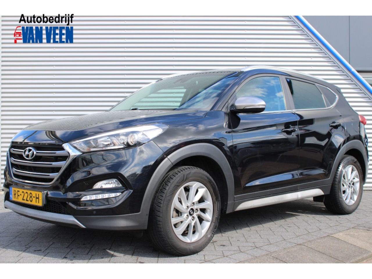 Hyundai Tucson - 1.6 GDi Comfort | Navi | Camera | Clima - AutoWereld.nl