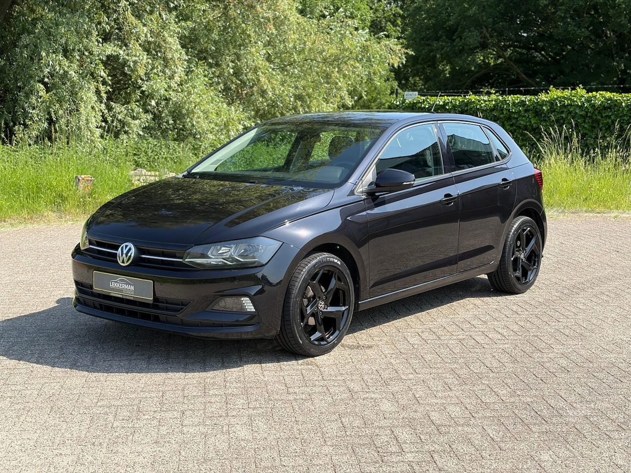 Volkswagen Polo - 1.0 High Line R-LINE VELGEN I BLUETOOTH I 1E EIGENAAR I PDC - AutoWereld.nl