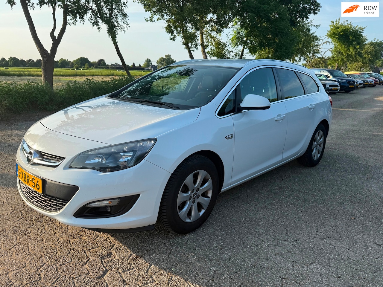 Opel Astra Sports Tourer - 1.4 Business + Airco/Scherm Navigatie - AutoWereld.nl