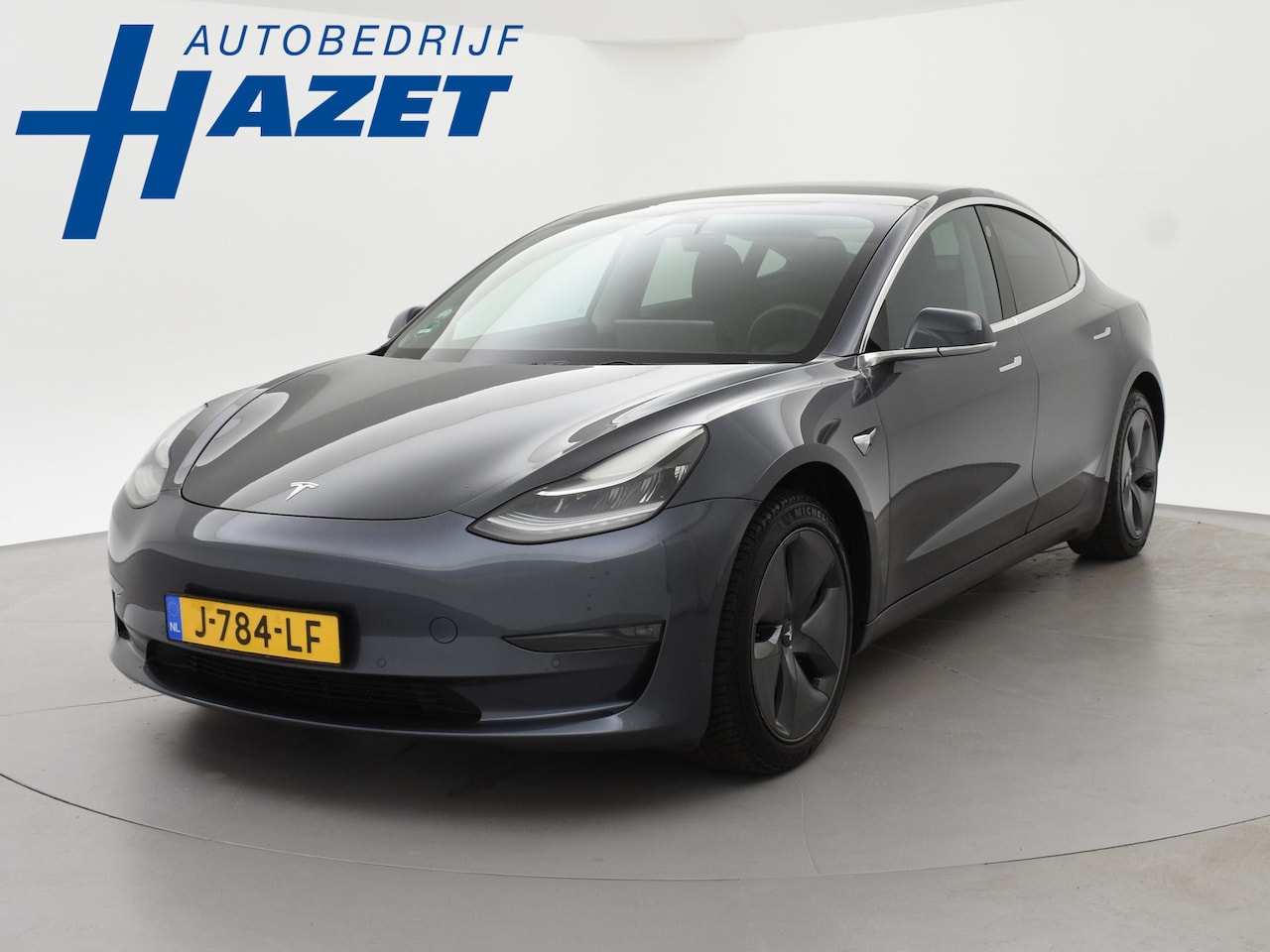 Tesla Model 3 - Long Range RWD LONG RANGE AWD 75 kWh + TREKHAAK | 560 KM WLTP | 1000 KG TREKGEWICHT OP KENTEKEN - AutoWereld.nl