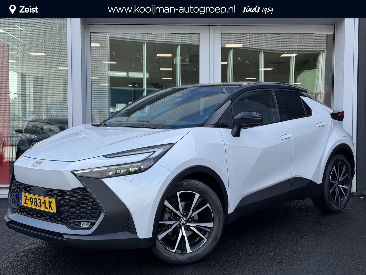 Toyota C-HR - 1.8 Hybrid 140 Style Bi-Tone | Unieke tellerstand!! | Dodehoeksensor | Stoelverwarming | V - AutoWereld.nl