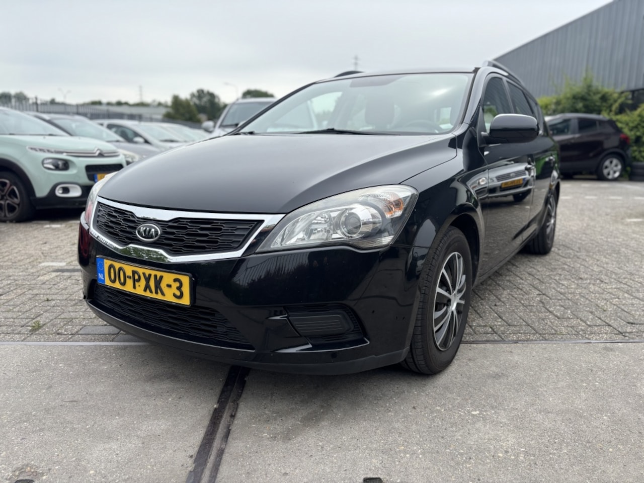 Kia Cee'd - 1.4 CVVT X-tra AIRCO! - AutoWereld.nl