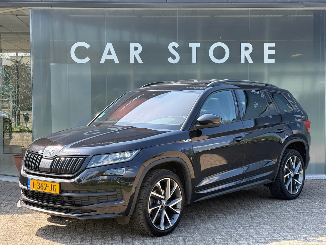 Skoda Kodiaq - 1.5 TSI DSG Sportline Pano|Memory|360cam|Canton|Sfeerverlichting - AutoWereld.nl