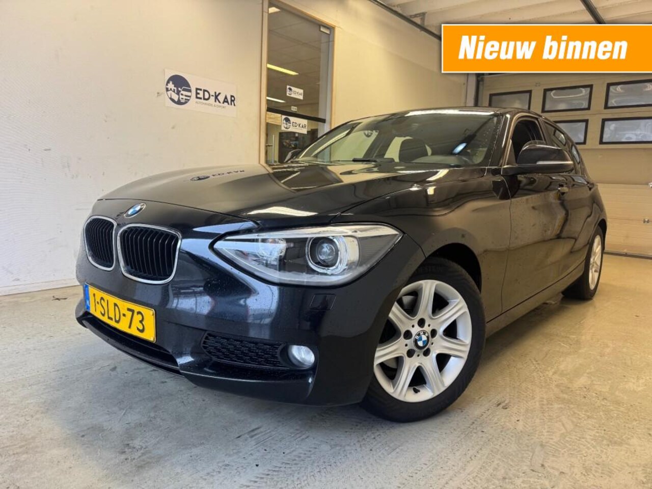 BMW 1-serie - 116i EDE Executive CLIMA NAVI XENON NAP APK 2-2027 - AutoWereld.nl