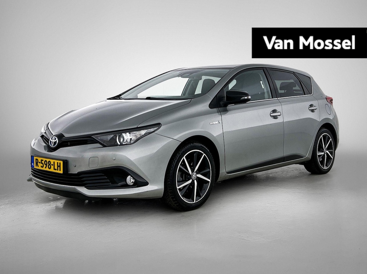 Toyota Auris - 1.8 Hybrid Executive | Navi | Stoel Verwarming | Cam | PDC | Cruise Control | ECC | 17"LMV - AutoWereld.nl