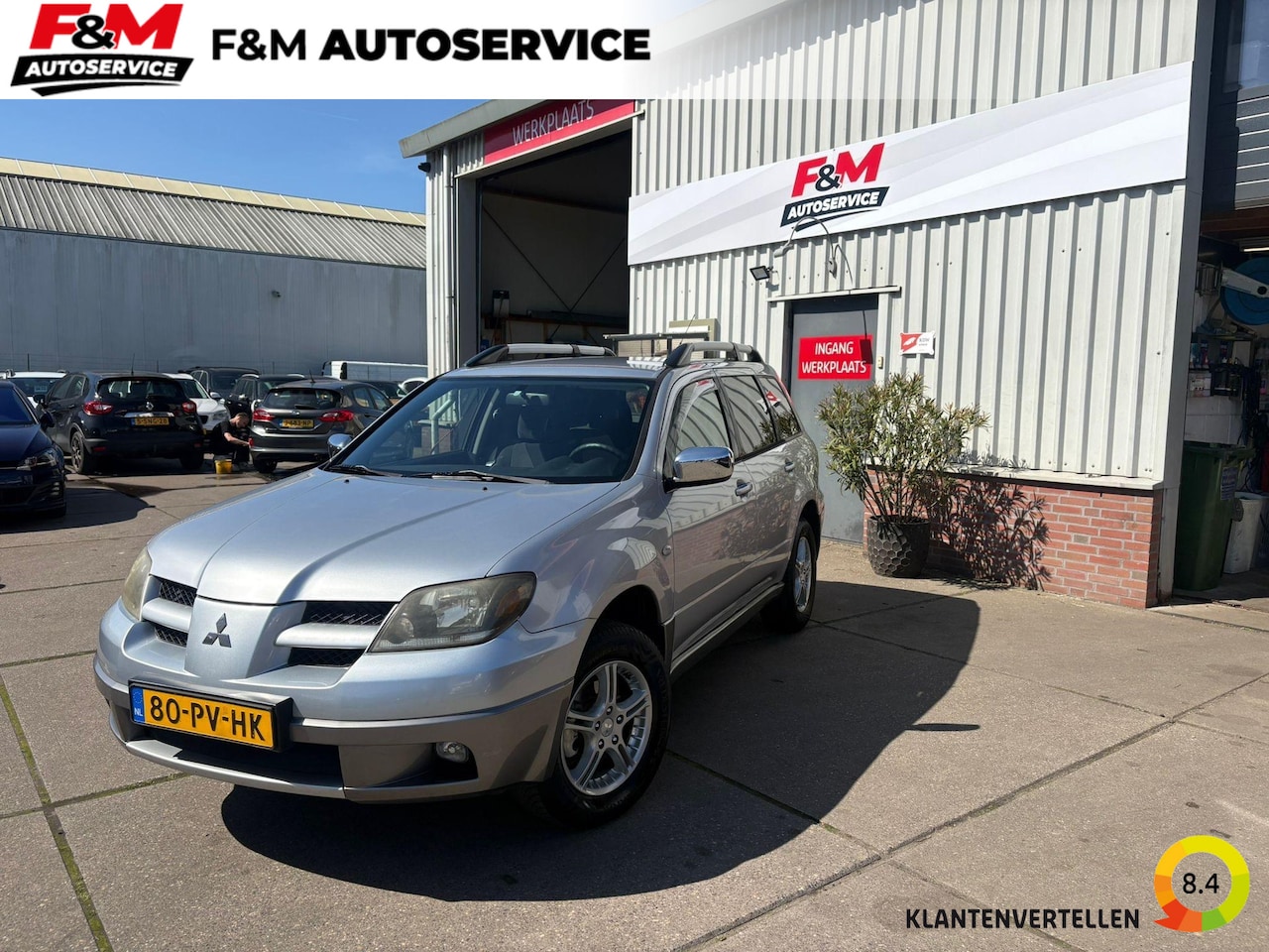 Mitsubishi Outlander Sport - 2.4 4WD Clima, pdc achter, trekhaak - AutoWereld.nl