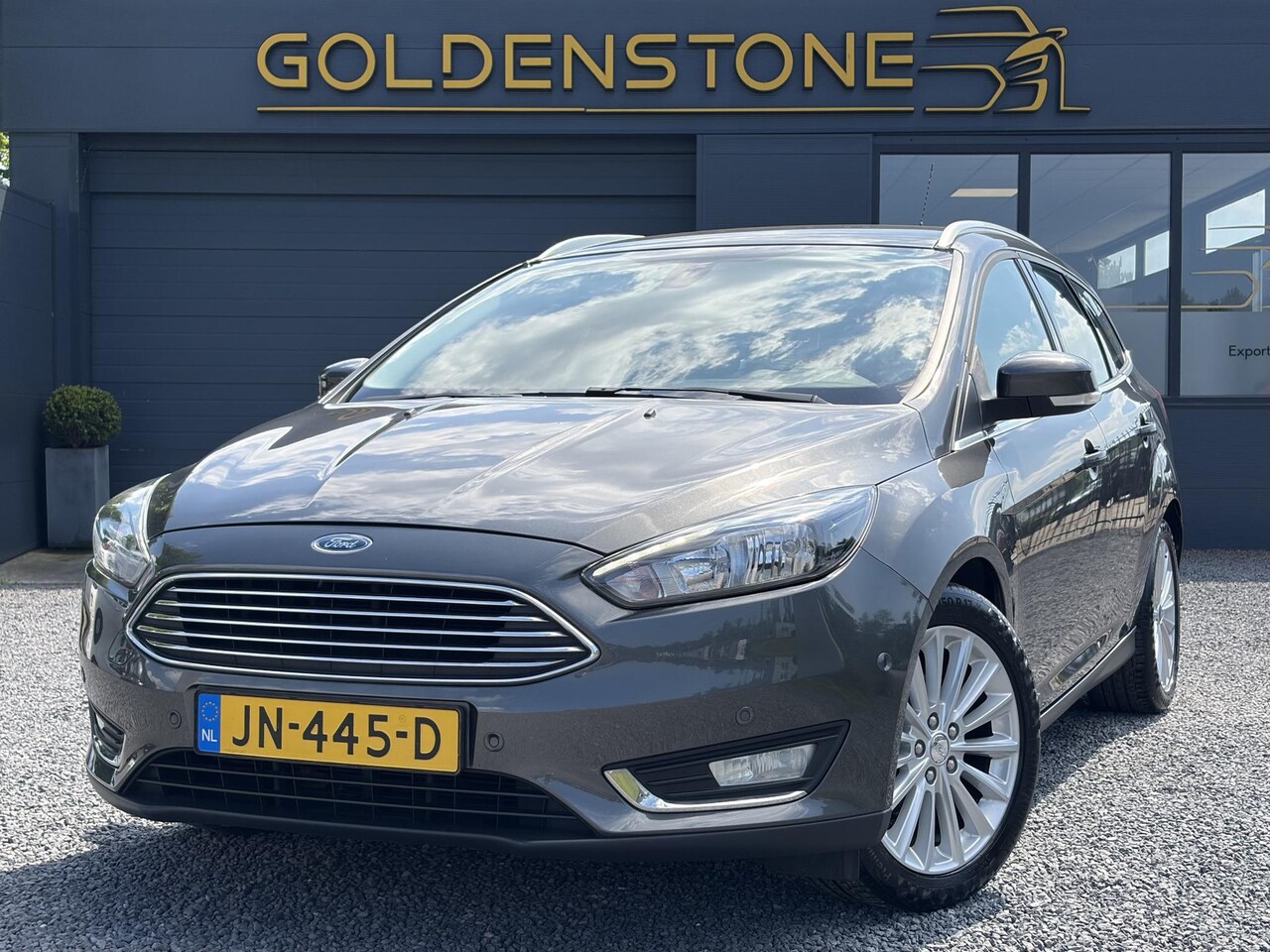 Ford Focus Wagon - 1.0 Titanium 1e Eigenaar,Dealer Onderhouden,125pk,Navi,Trekhaak,6 Bak,Clima,Cruise,Lm velg - AutoWereld.nl