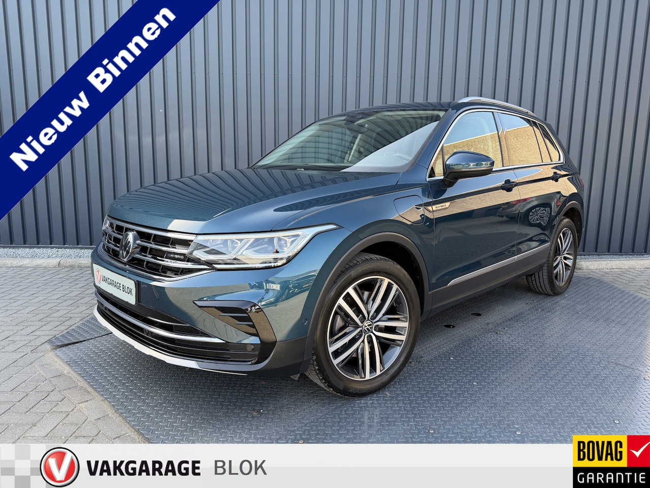 Volkswagen Tiguan - 1.4 TSI eHybrid Elegance | Night shade bleu | Licht interieur | Schuifkantel dak | Rijklaa - AutoWereld.nl
