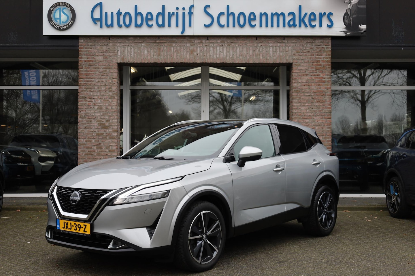 Nissan Qashqai - 1.3 MHEV Xtronic Tekna Plus PANO HUD MASSAGE MEMORY CARPLAY 360-CAM LEER STOEL/STUUR/RUITV - AutoWereld.nl