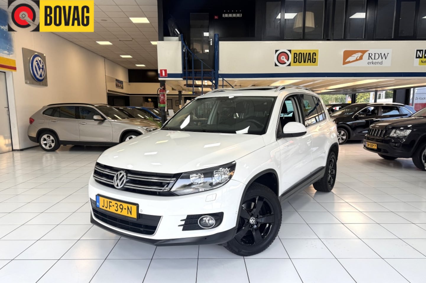 Volkswagen Tiguan - 1.4 TSI Sport&Style Bovag Garantie - AutoWereld.nl