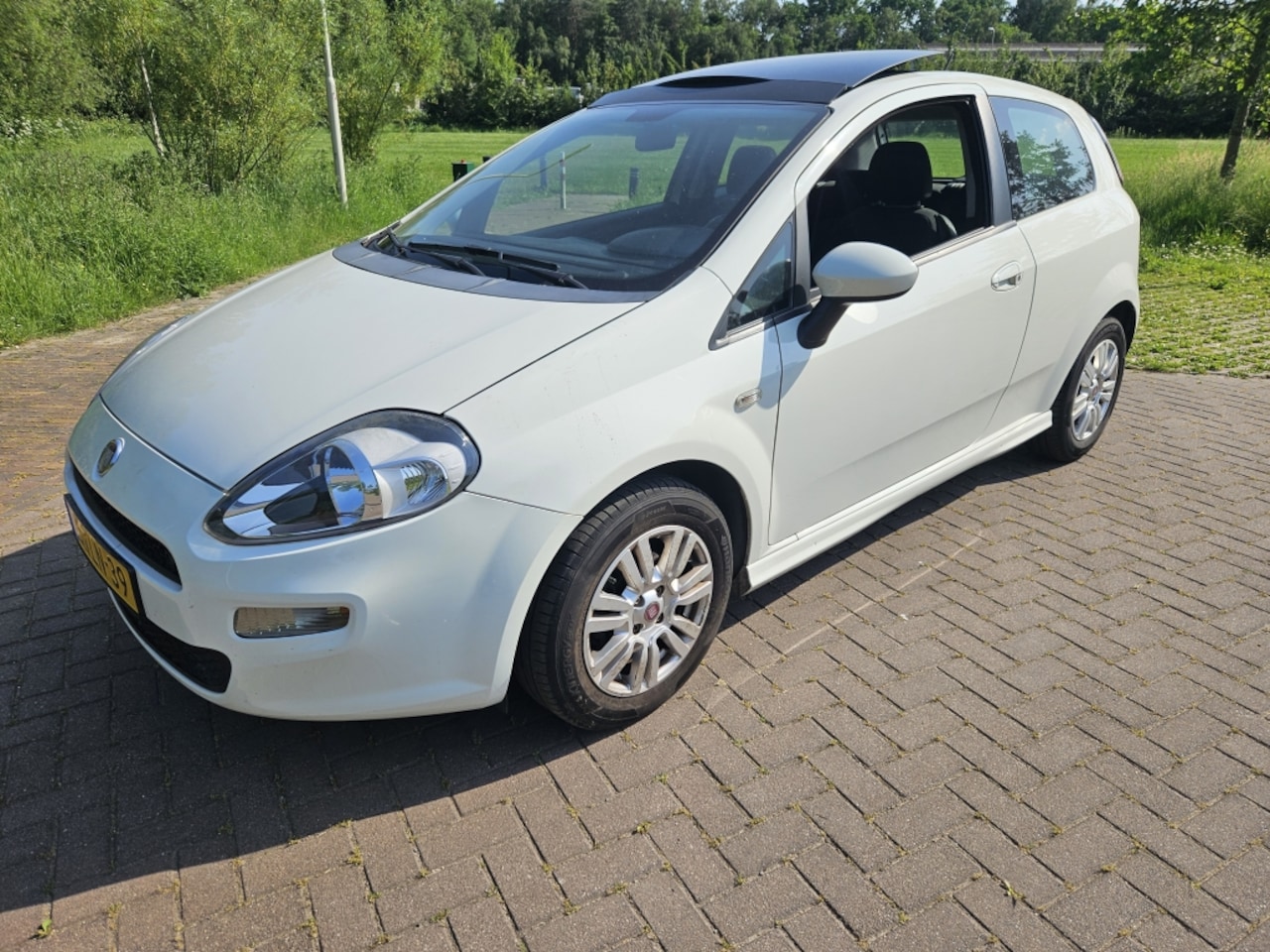 Fiat Punto Evo - 0.9 TwinAir Young 0.9 TwinAir Young - AutoWereld.nl