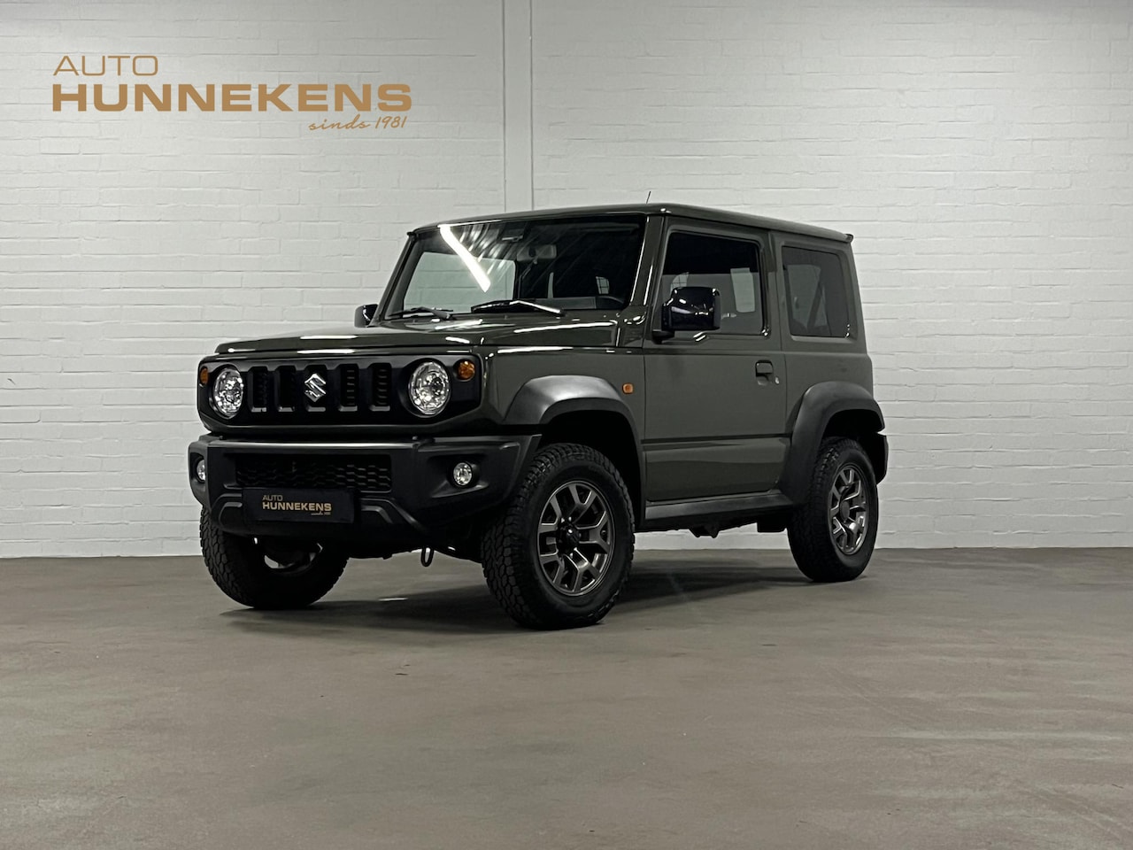 Suzuki Jimny - 1.5 Stijl 4 Persoons Trekhaak | Cruise-/ climate control | Stoelverwarming | Airco | Navig - AutoWereld.nl