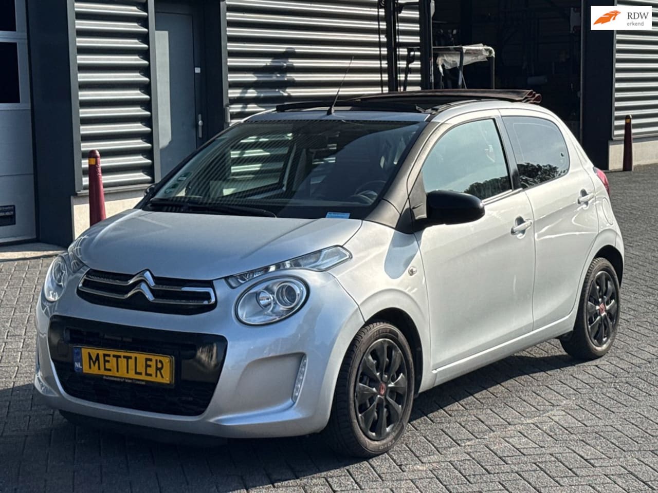 Citroën C1 - 1.2 PureTech Airscape Shine | cabrio top | cruise control | airco - AutoWereld.nl