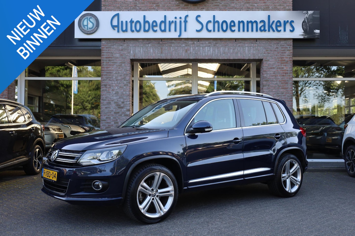 Volkswagen Tiguan - 2.0 TSI Sport&Style 4motion R-line Edition TREKHAAK LEER STOELVERWARMING CRUISE NAVI PDC C - AutoWereld.nl