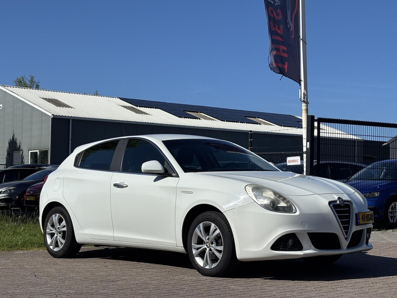 Alfa Romeo Giulietta - 1.4 T Distinctive trekhaak cruise pdc - AutoWereld.nl